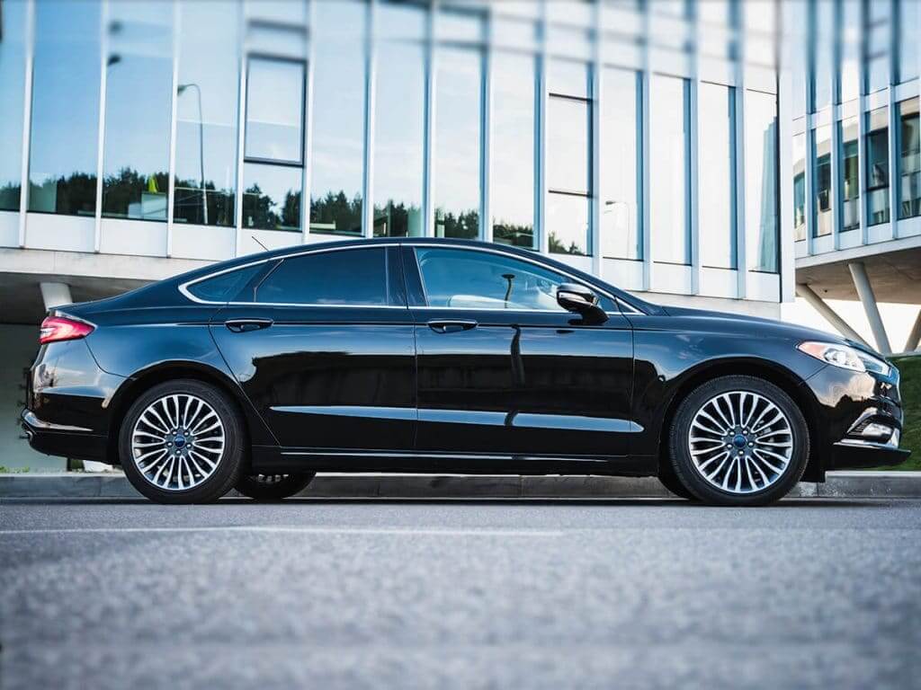 shiny new car with great black paint job