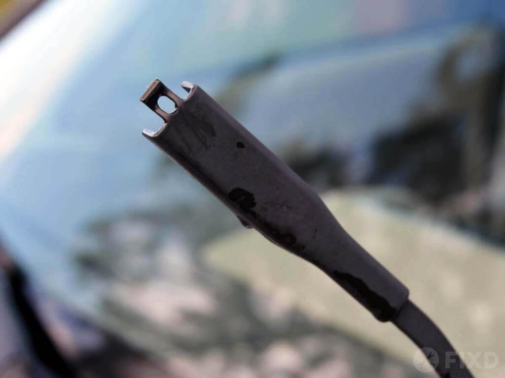 Detailed closeup showing the end of the windshield wiper arm