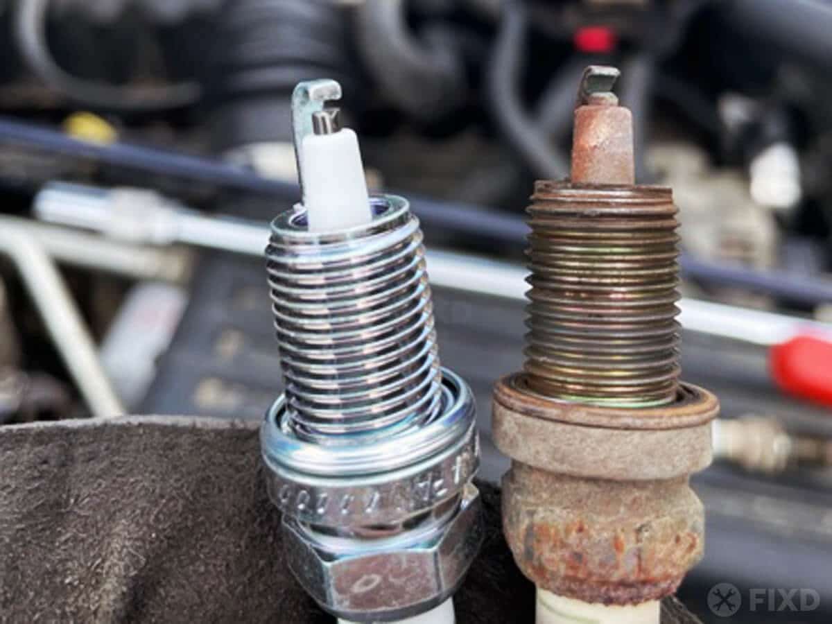new spark plug versus old, worn-out spark plug