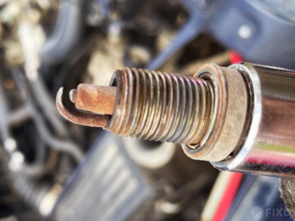 a worn out spark plug in need of replacement