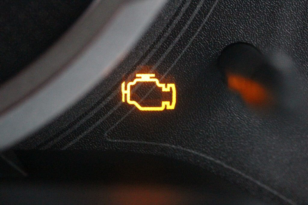Vehicle warning lamp close-up: check engine