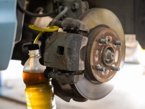 Automatic change of brake fluid in a car service
