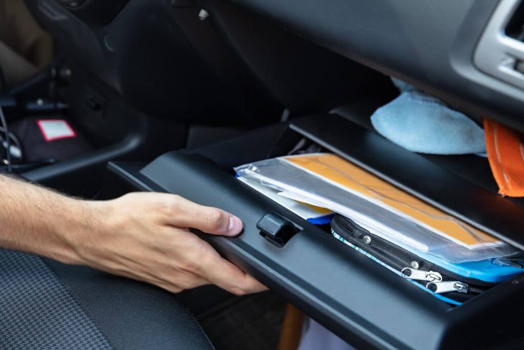 Driver Hand Opening Glovebox Compartment Inside Car