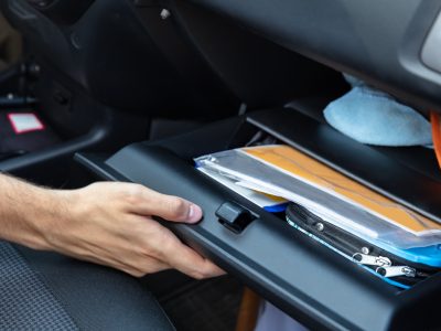 Driver Hand Opening Glovebox Compartment Inside Car