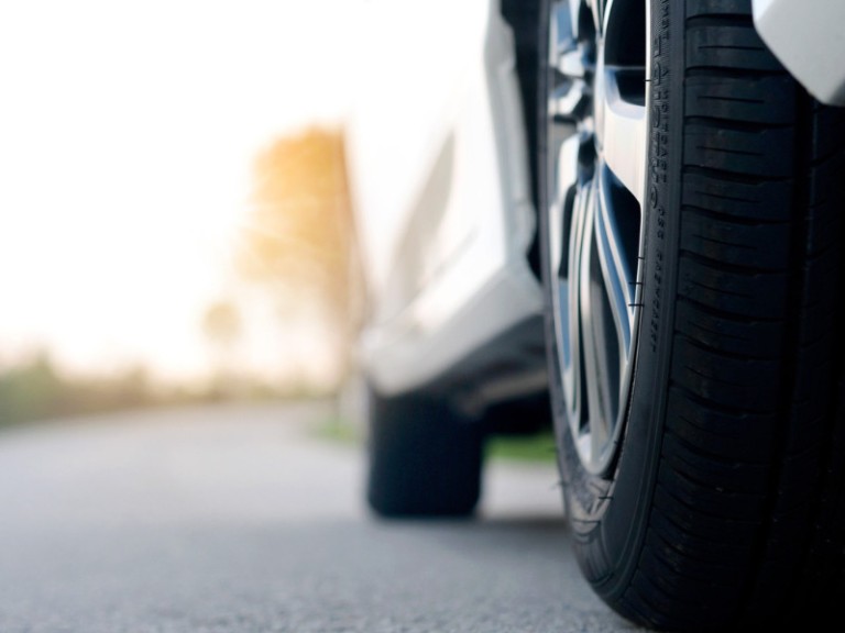 car on the road stopping