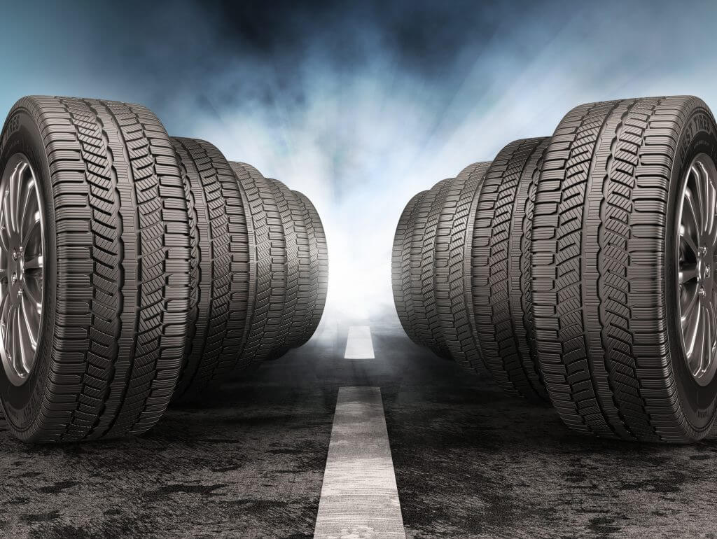 Car tires standing on the road against light of headlights. 3d illustration