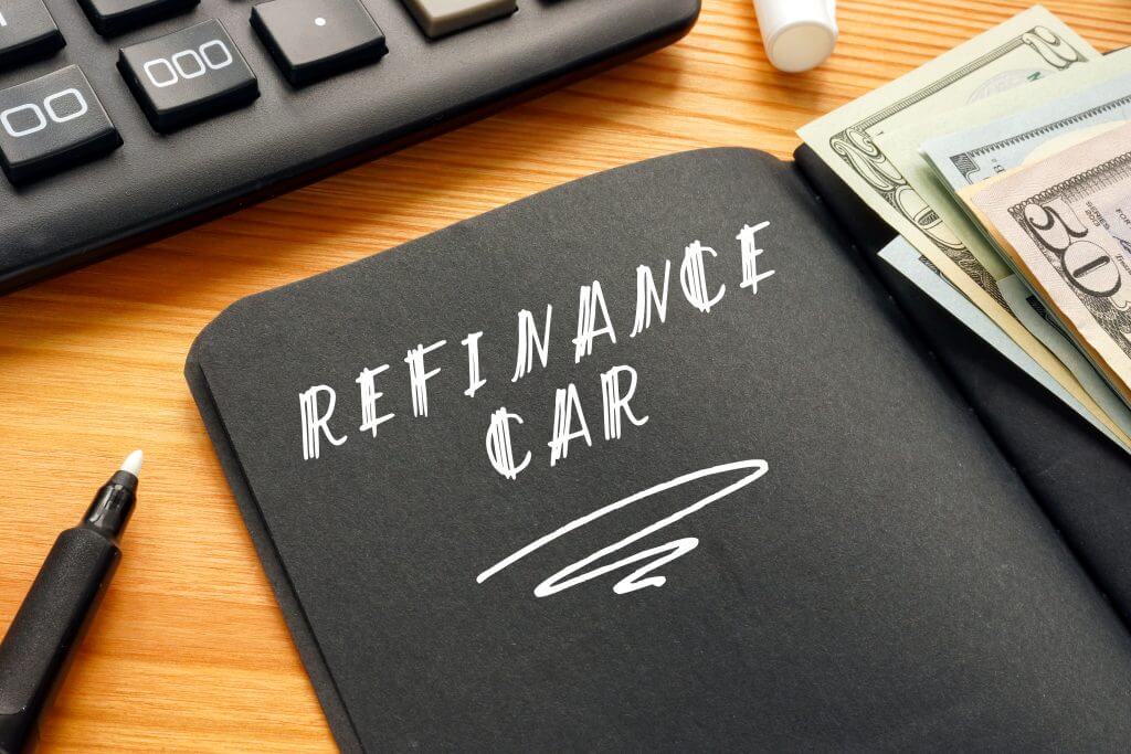 Business concept meaning REFINANCE CAR with inscription on the piece of paper.