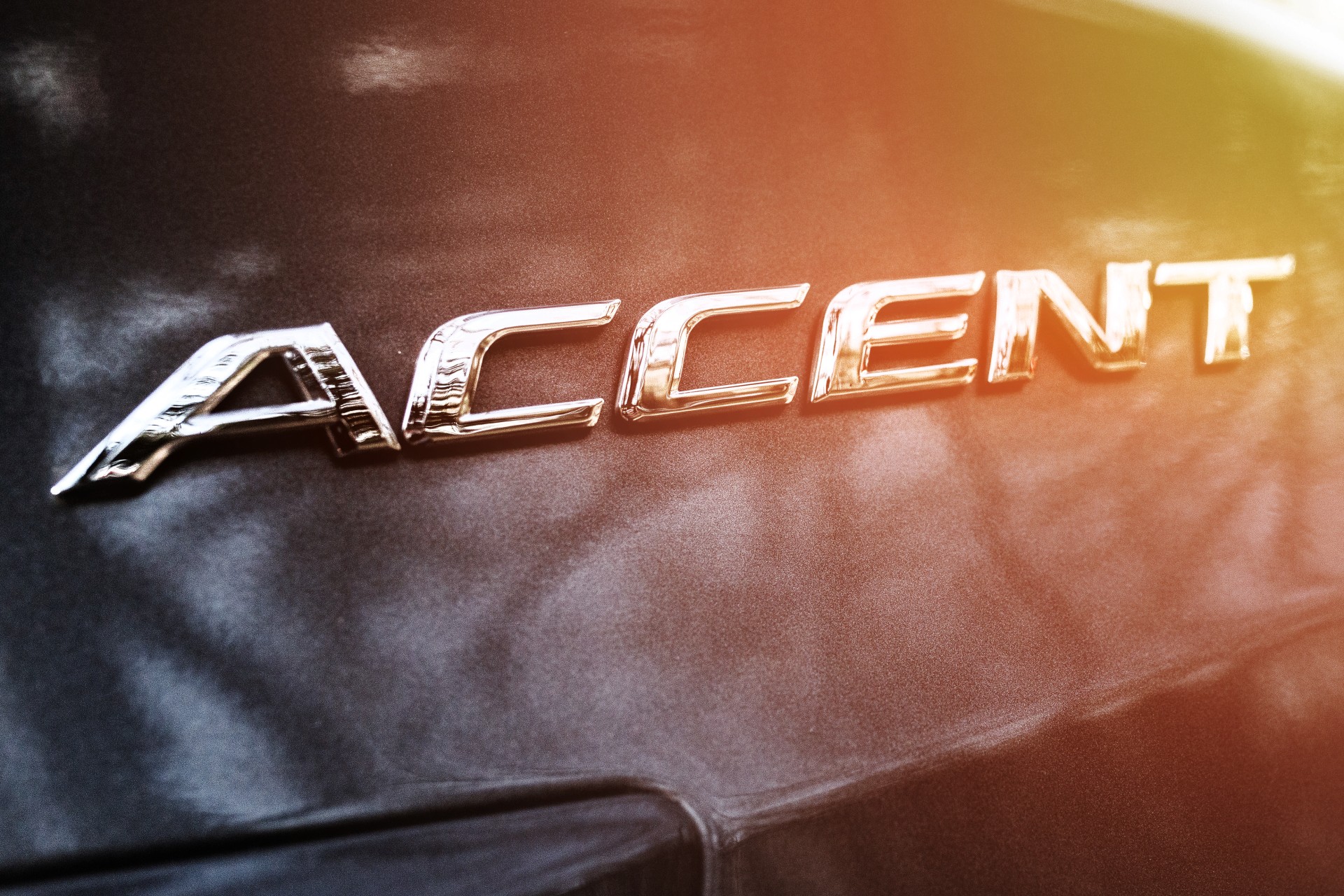 ACCENT logo on the trunk lid of a Hyundai car