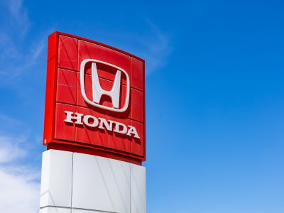 Honda Logo with Blue Skyline