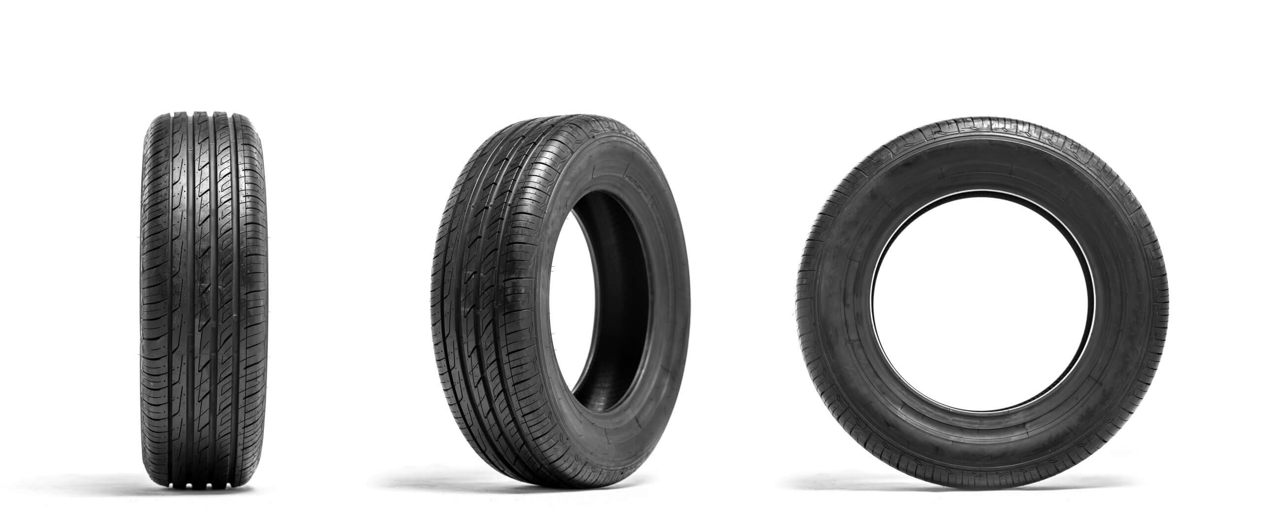 New car tires isolated on white background. Tyre service or shop advertising