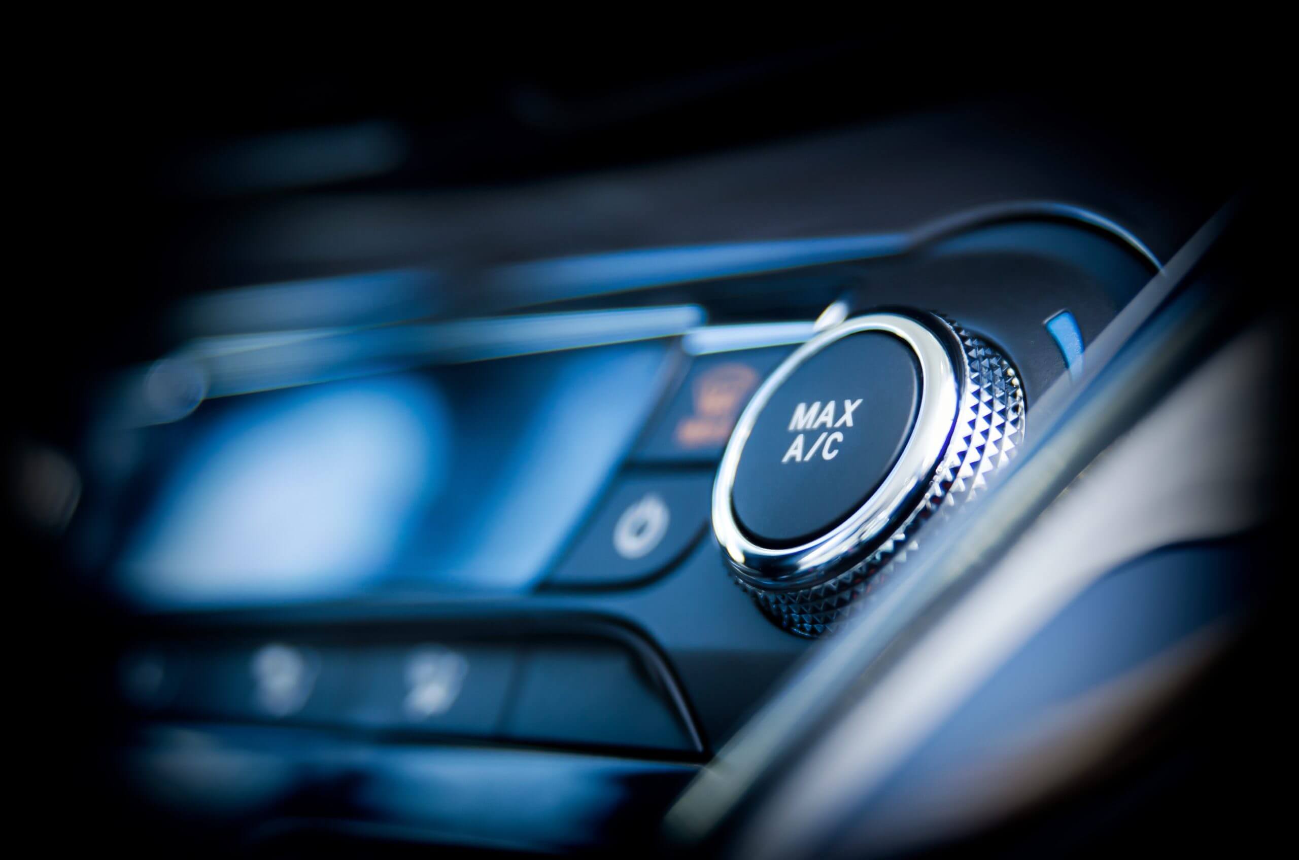 Air conditioning button inside a car. Cold, heat control concept