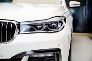 Bangkok , Thailand 2019 : close up headlight front view of BMW 730 Ld M Sport luxury car presented in motor show Thailand .