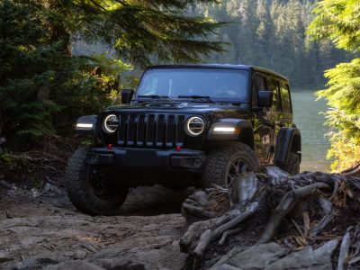 Mission, British Columbia, Canada - August 6, 2018: Jeep Rubicon is riding thru rough and rugged terrain to the lake.