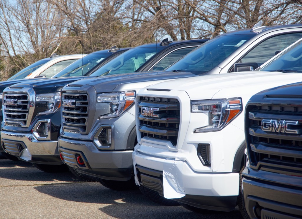 Montreal, Canada - April 4, 2020: GMC new 2020 trucks in a line at dealership. GMC General Motors Company is a division of the American automobile manufacturer General Motors GM
