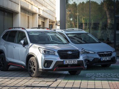 Antalya, Turkey - February 18, 2023: New cars next to the car dealership. Silver Subaru Forester, Impreza is parked on the street o n a warm day against autosalon
