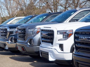 GMC new 2020 trucks in a line at dealership. GMC General Motors Company is a division of the American automobile manufacturer General Motors GM