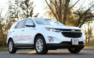 2017 Chevrolet Equinox SUV in white parked at a park