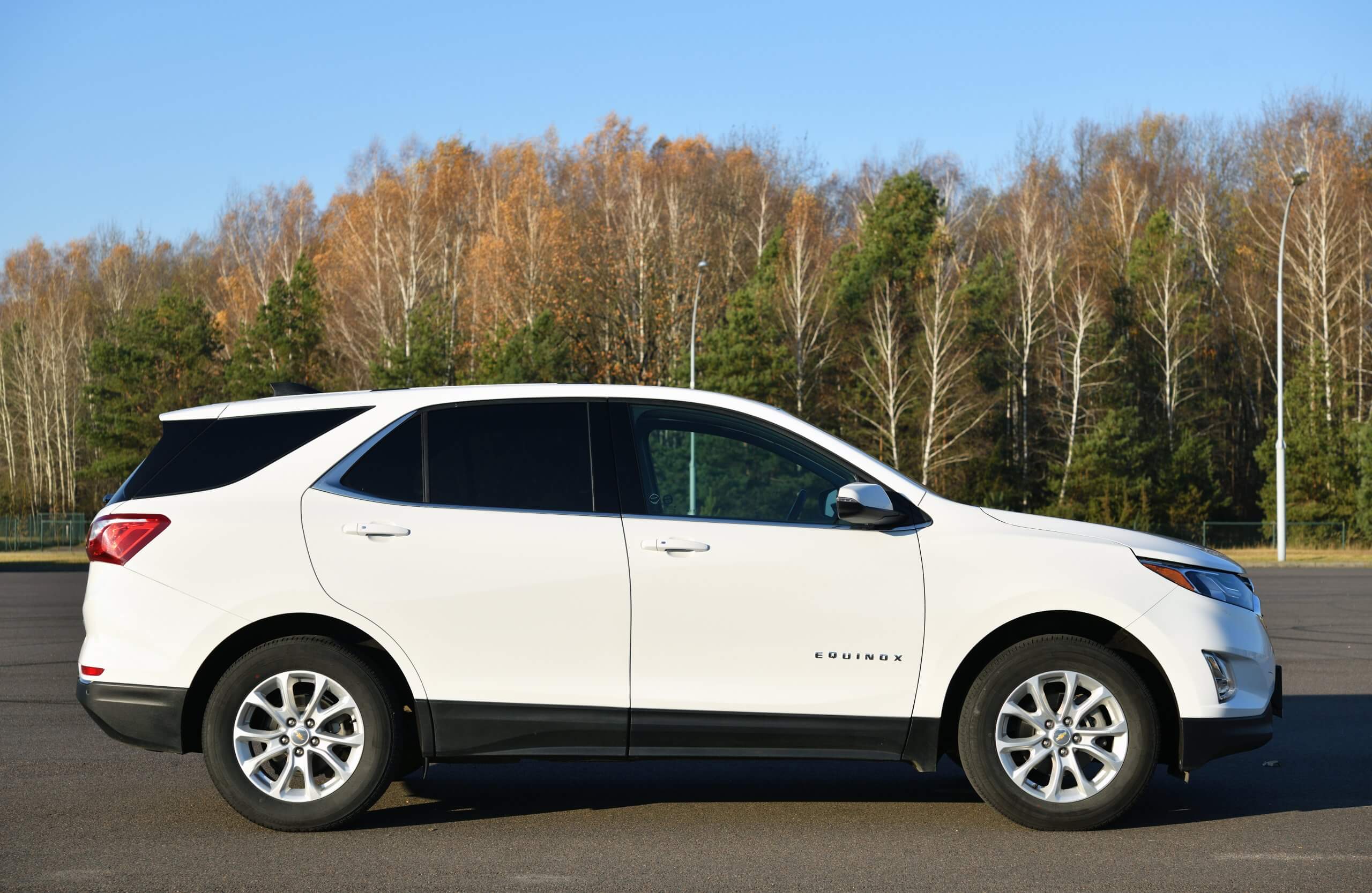 2017 Chevrolet Equinox SUV in white parked at a park