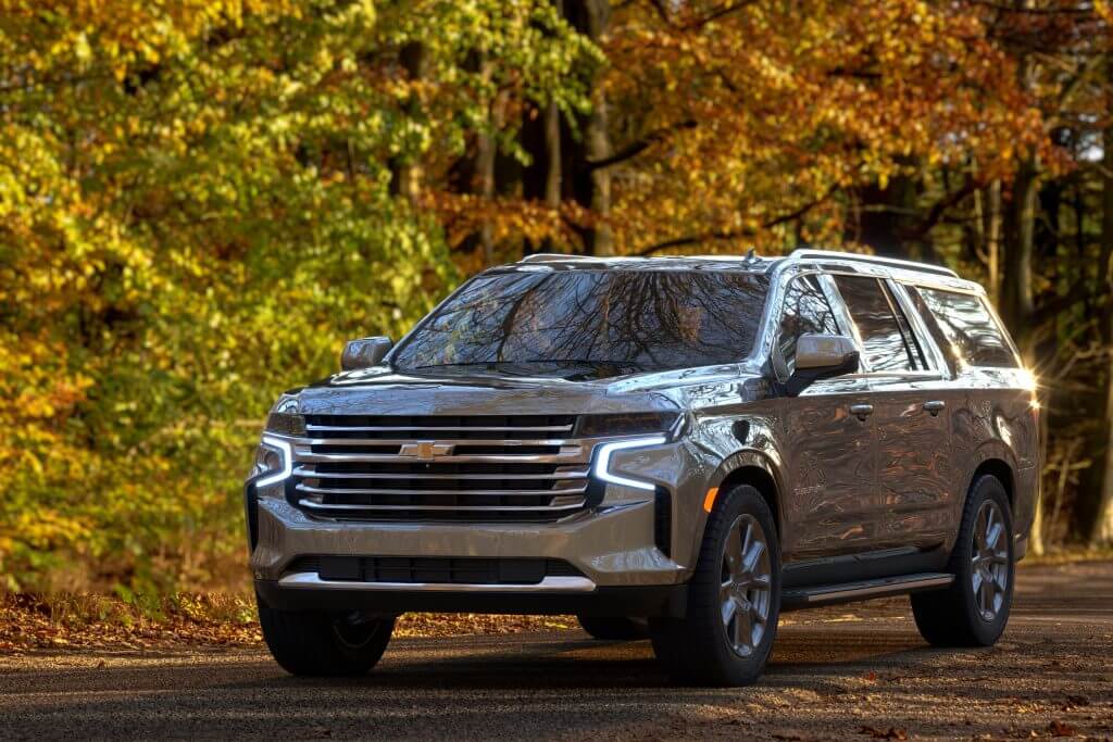 Chevy Tahoe-Full-Size 7-8 Passenger SUV against an autumn background