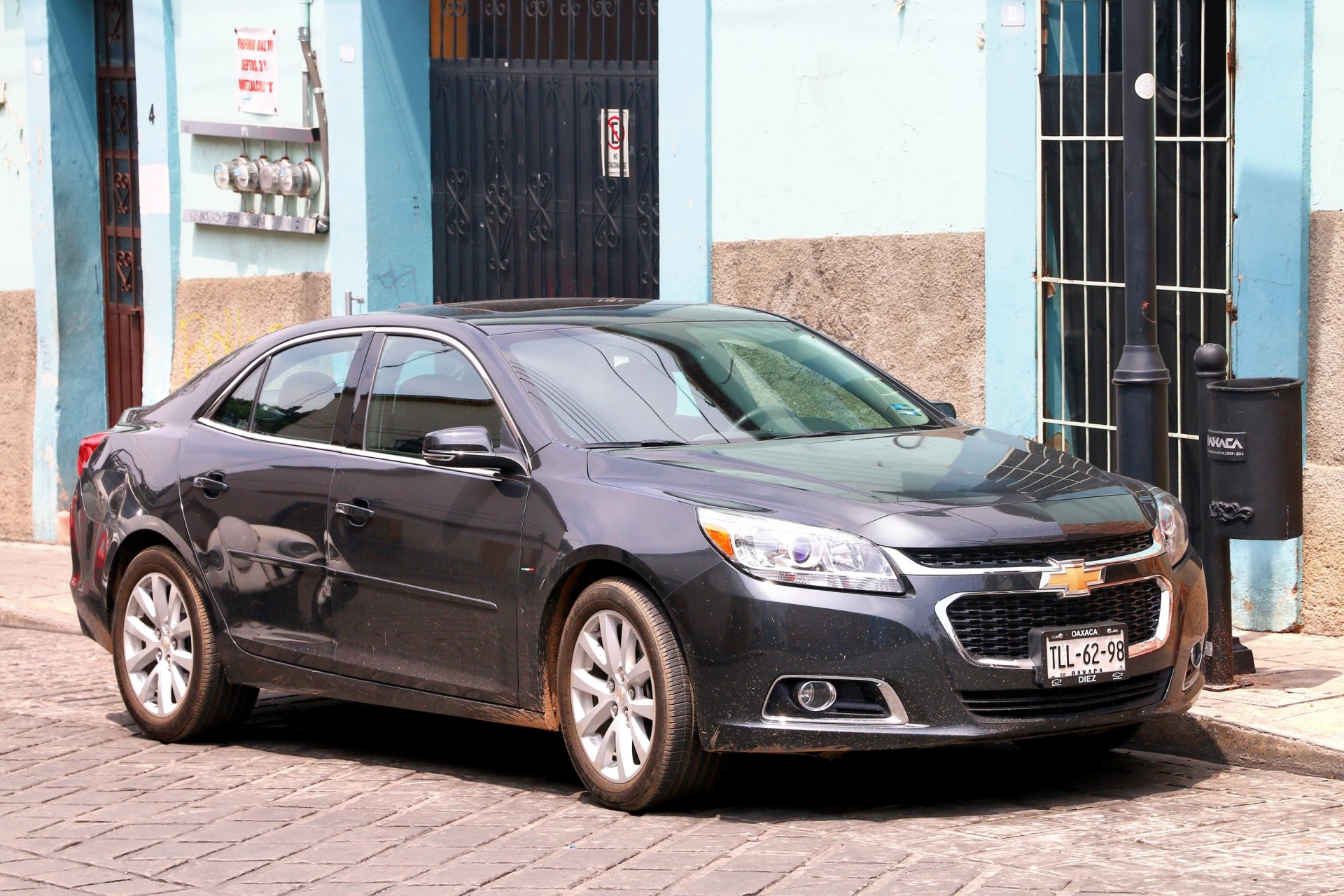 2014 Chevrolet Malibu in the city street.