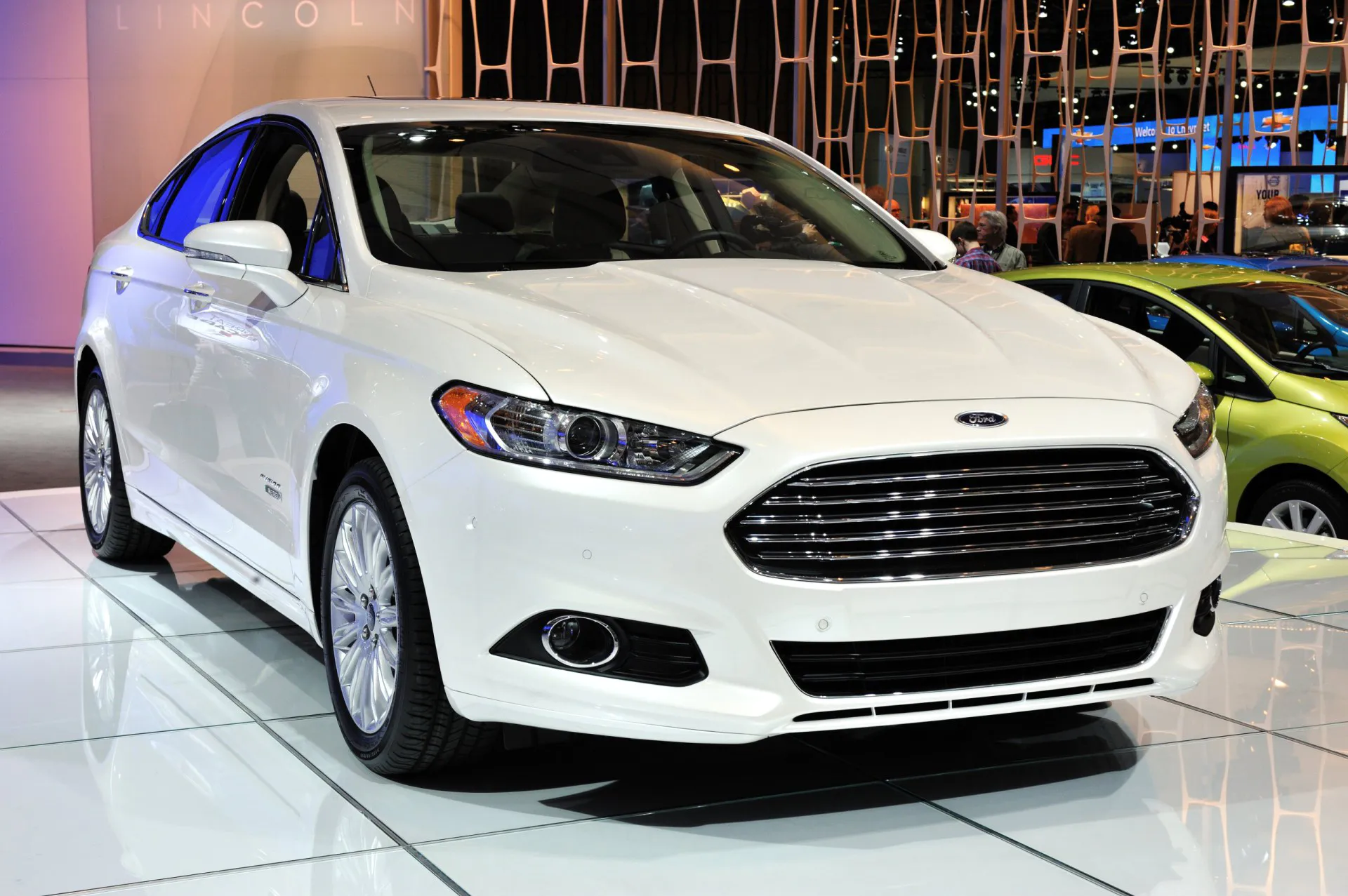 2014 White Ford Fusion display at an auto show