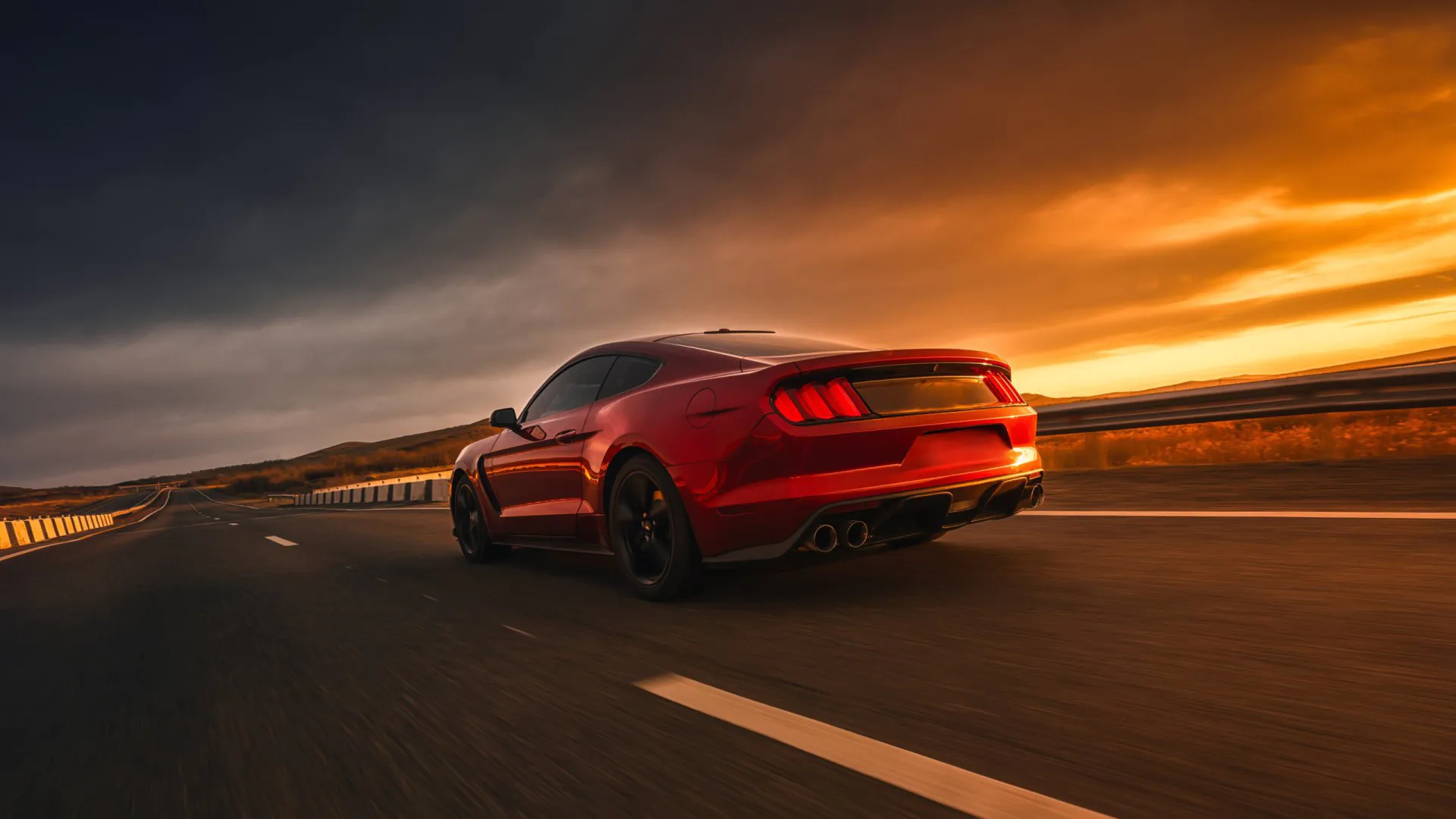 2015 Ford Mustang driving on a highway at sunset