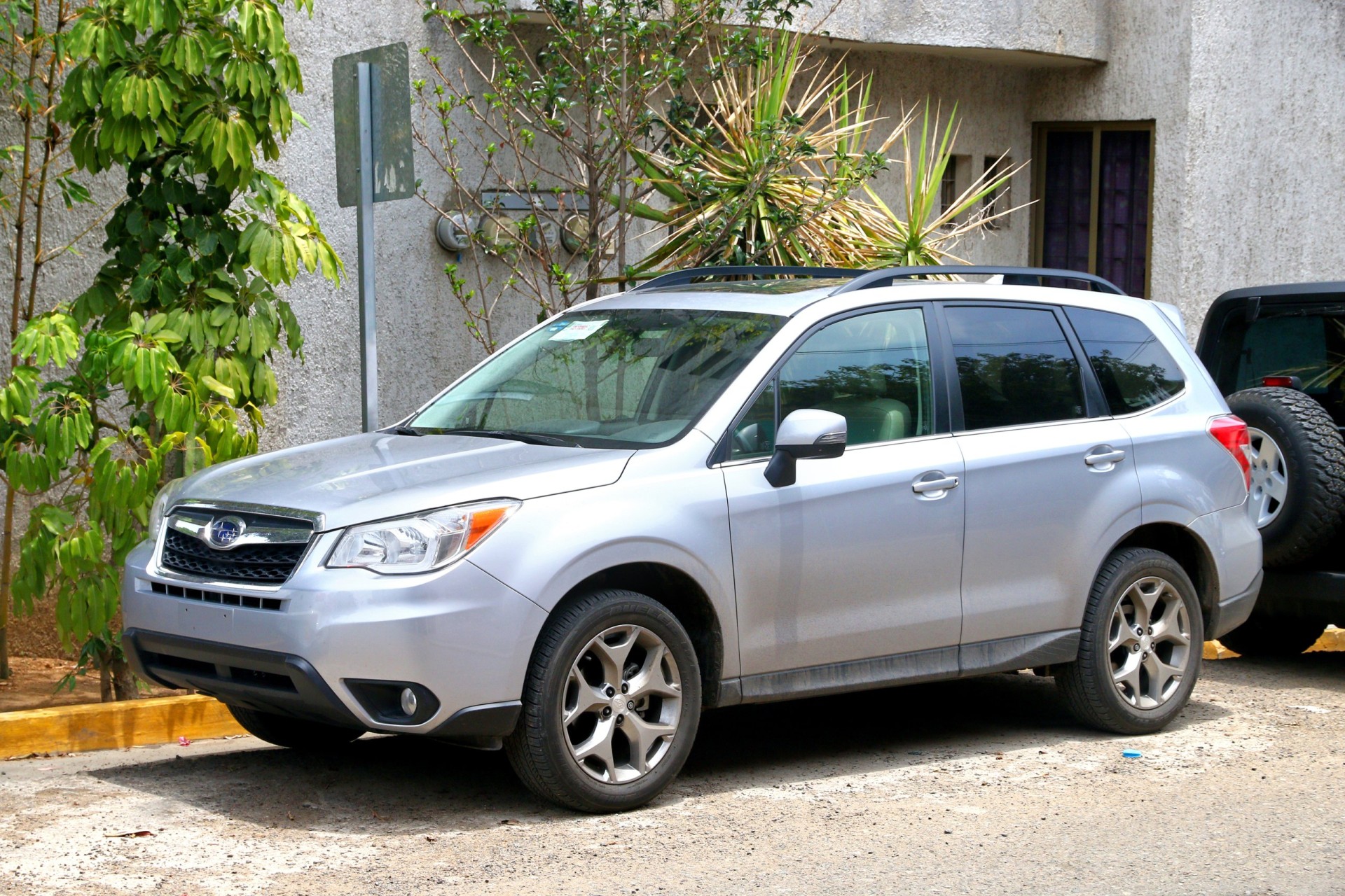 2015 Subaru Forester in the city street.