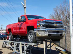 Mounted Chevrolet 2500 HD red truck