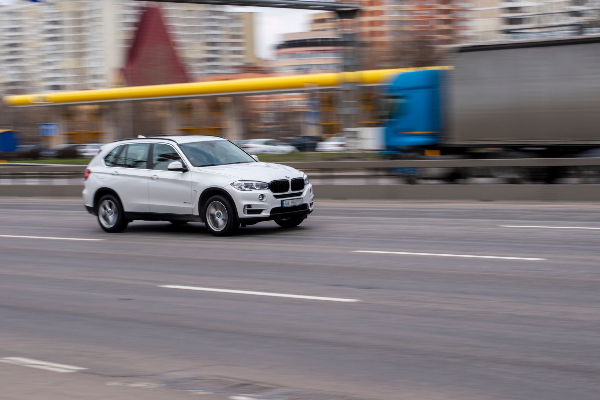 2017 White BMW X5 car moving on the street