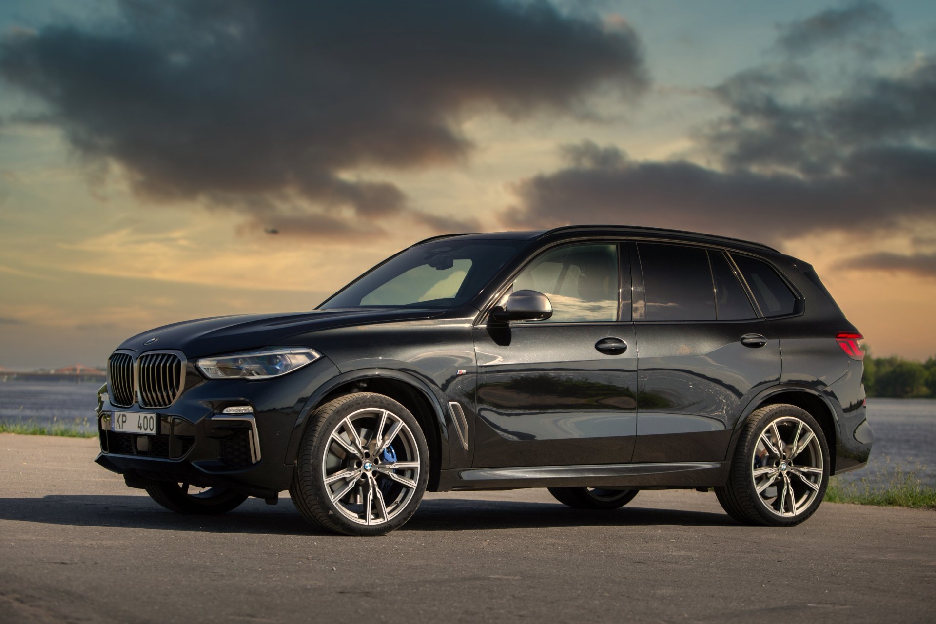 2020 BMW X5 G05 near river at the sunset