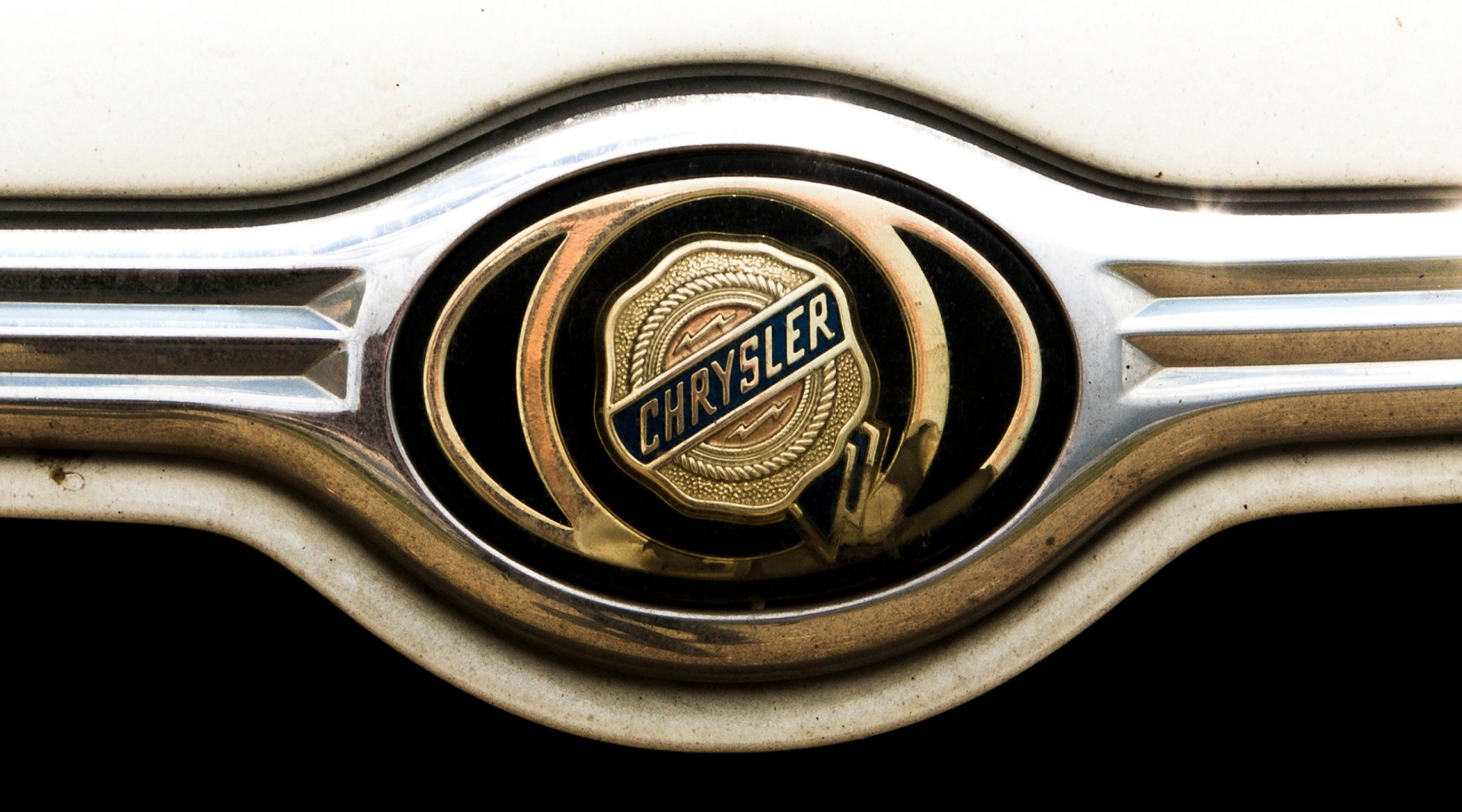 Chrysler car sign logo vehicle. White