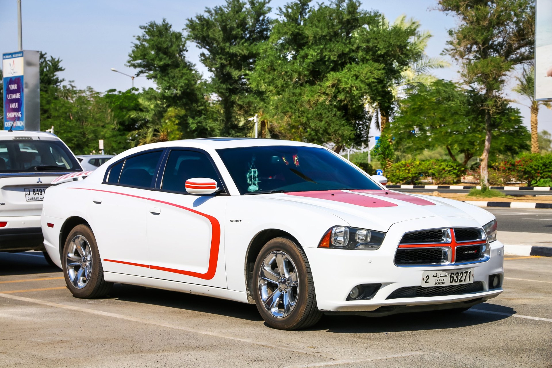 2011 American muscle car Dodge Charger in the sand desert.