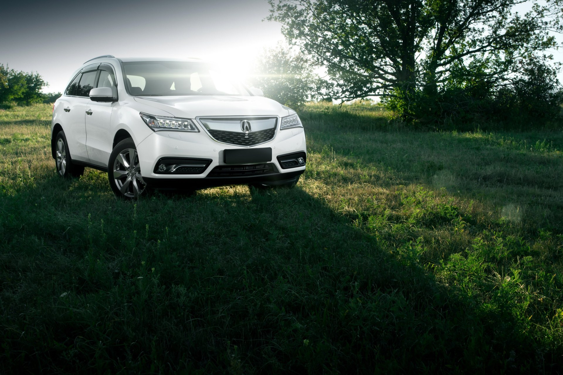 2016 Acura MDX standing on road at sunset