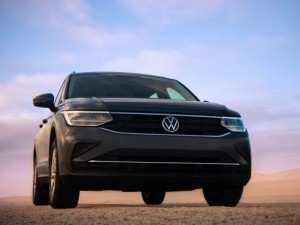 Grey Volkswagen Tiguan against a dramatic sky