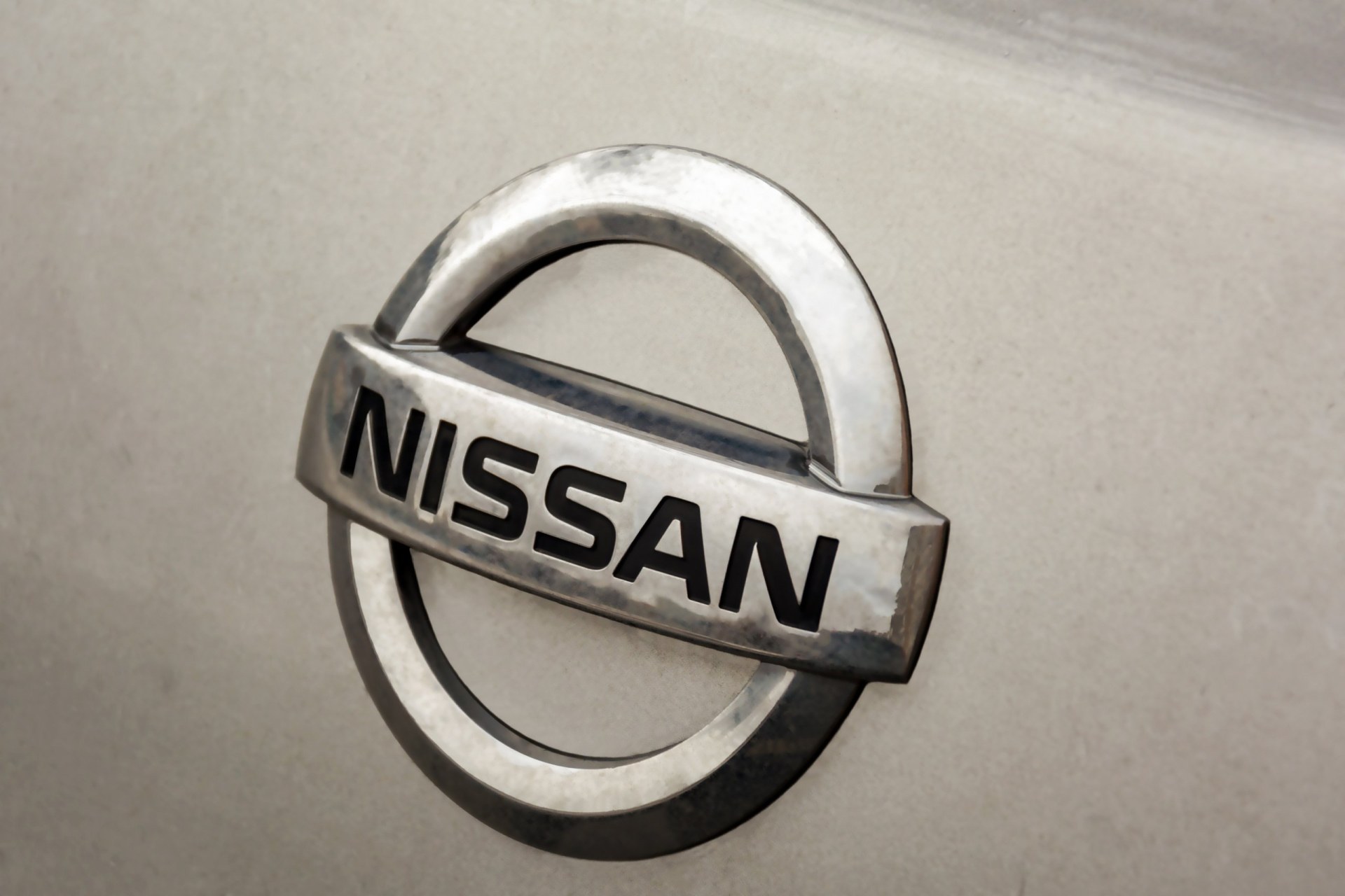 the logo of the Japanese automobile company NISSAN on the boot lid