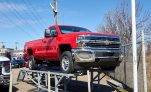 Chevrolet 2500 HD red trucK on a ramp