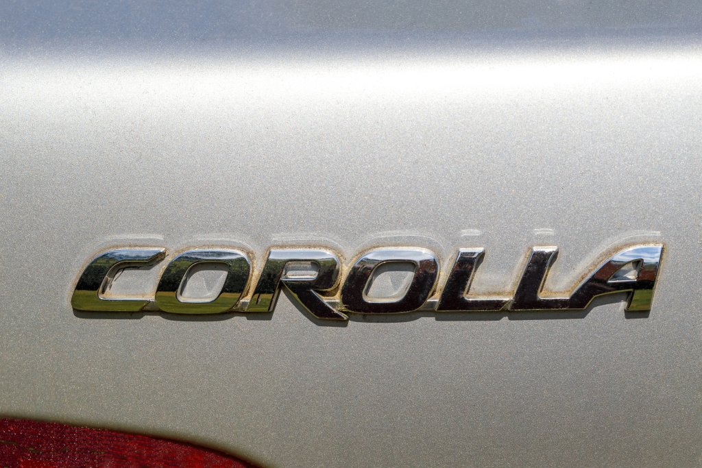 The Toyota corolla logo is located on the back of the vehicle.
