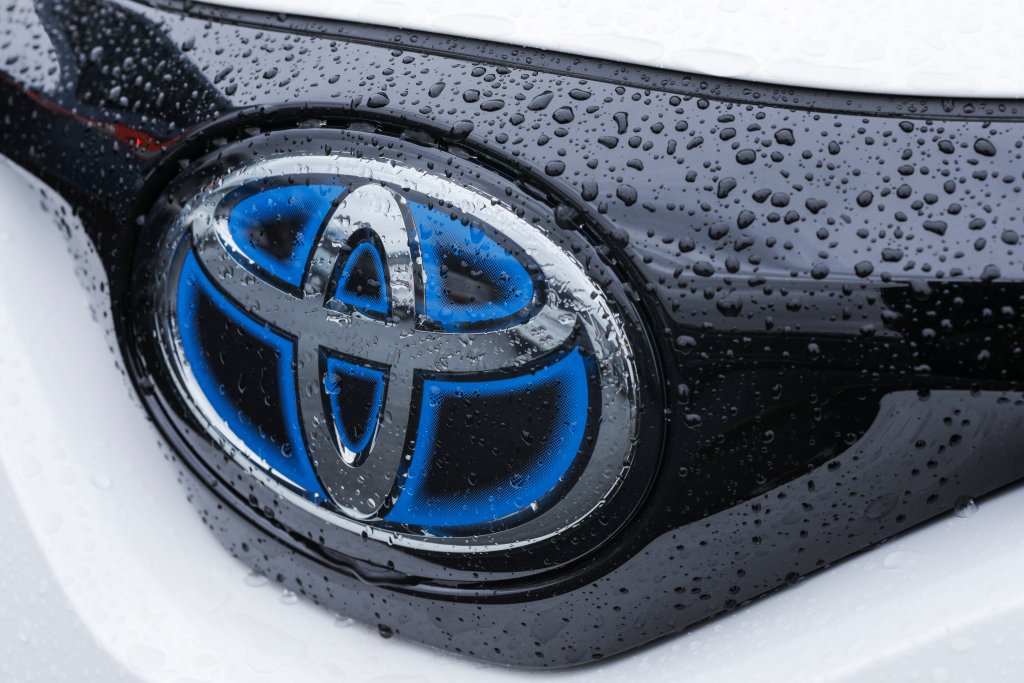 Closeup photo of Toyota logo emblem