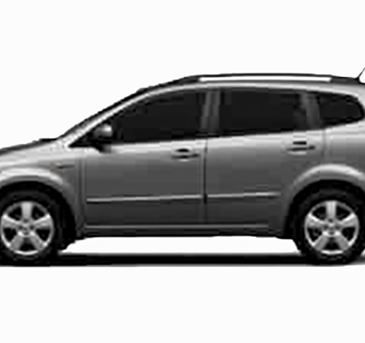 2010 Kia Rondo against a white background