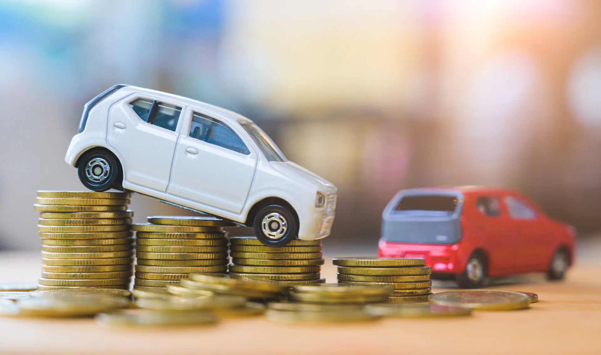 Car and stack of coin. Saving money for car concept. Car finance, buy car new concept.