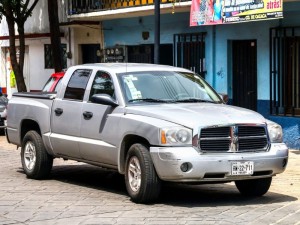 Pickup truck Dodge Dakota in the city street.