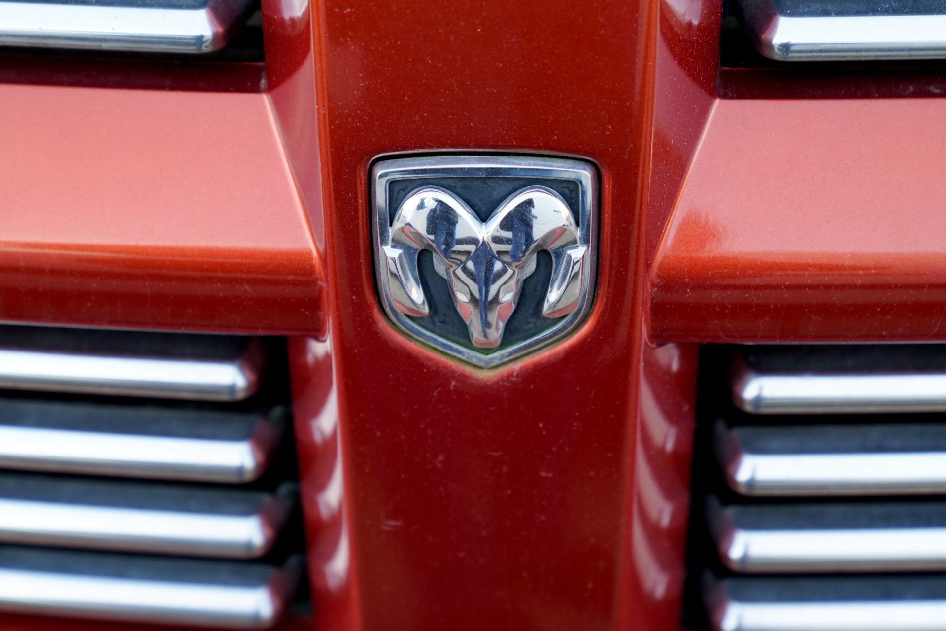 Dodge truck logo sign red closeup photo
