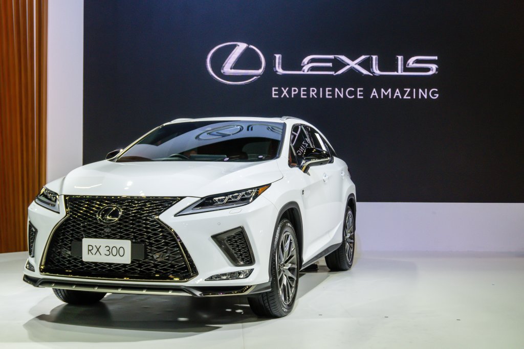 Lexus RX 300 midsize crossover SUV display on stage at a car expo