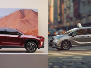 Toyota Highlander and Honda Odyssey Side by side facing each other